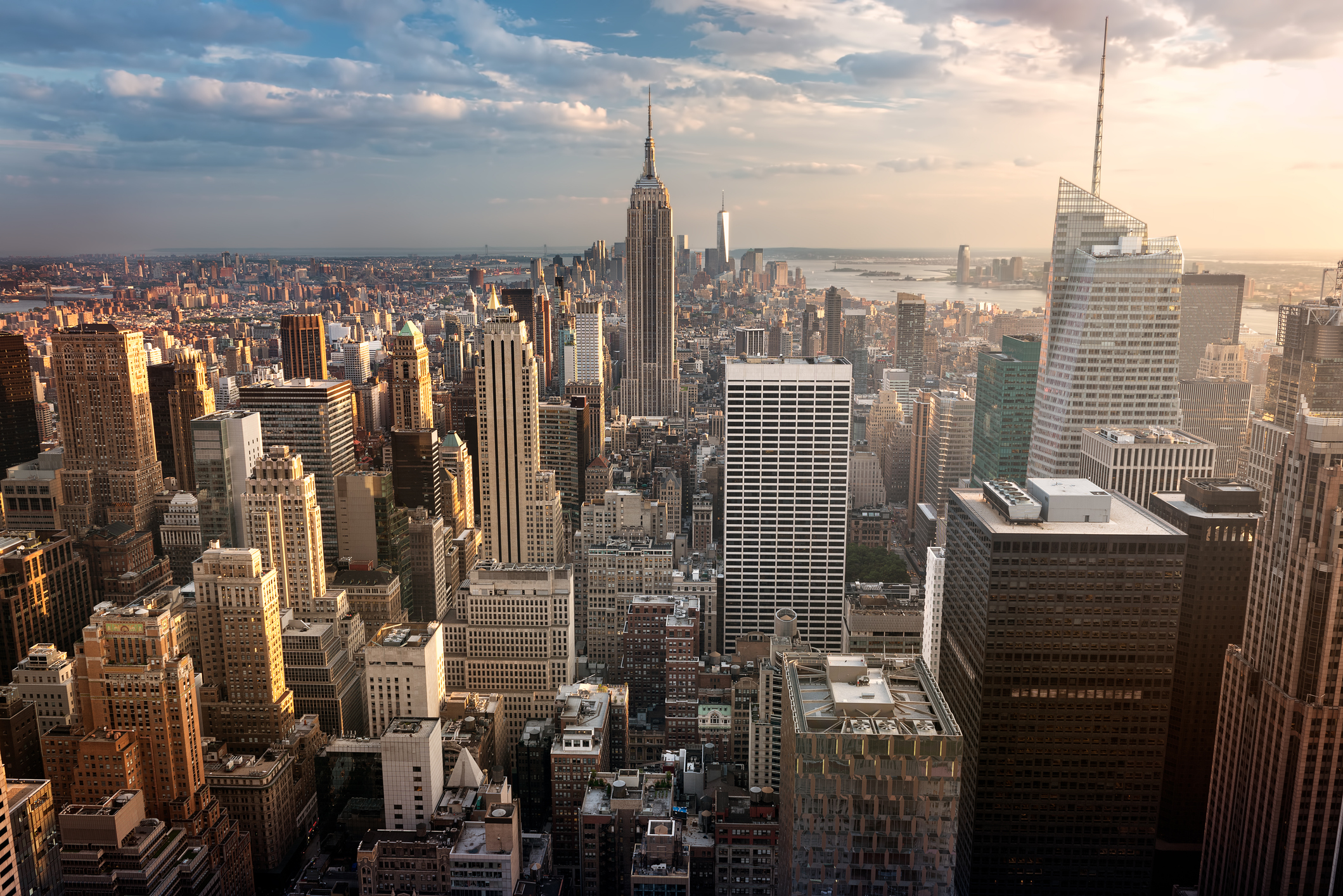 New York City skyline with urban skyscrapers at sunset, USA.