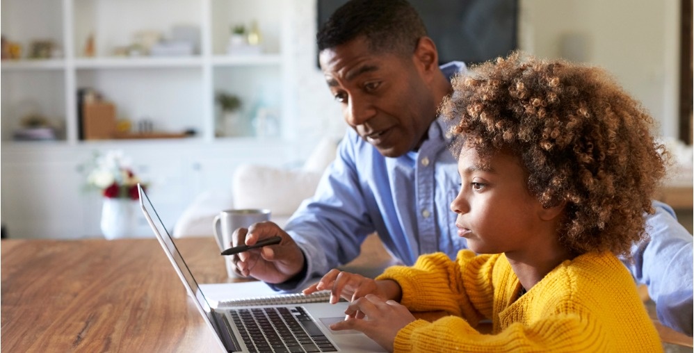 Pre-teen girl on laptop