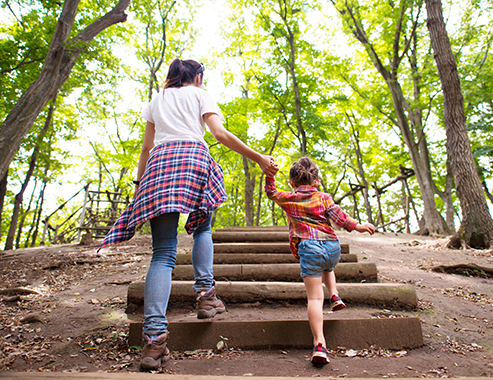 mom and daughter summer hike