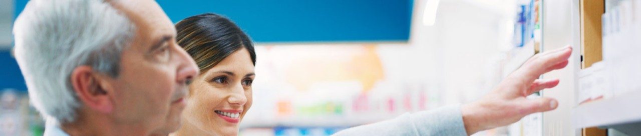 Shot of a pharmacist assisting a customer in a chemist