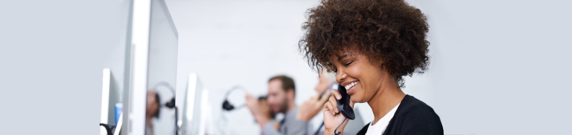 Young woman smiling and talking on the phone