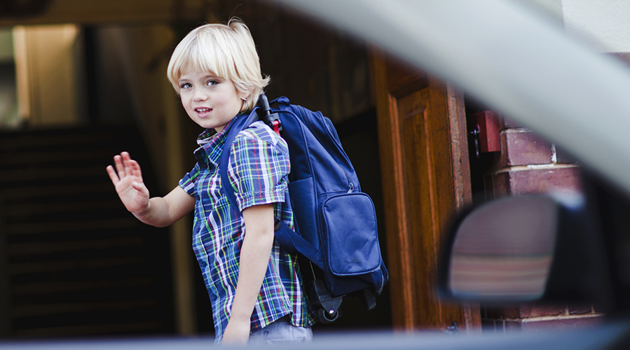 Parent is dropping off kid at school.